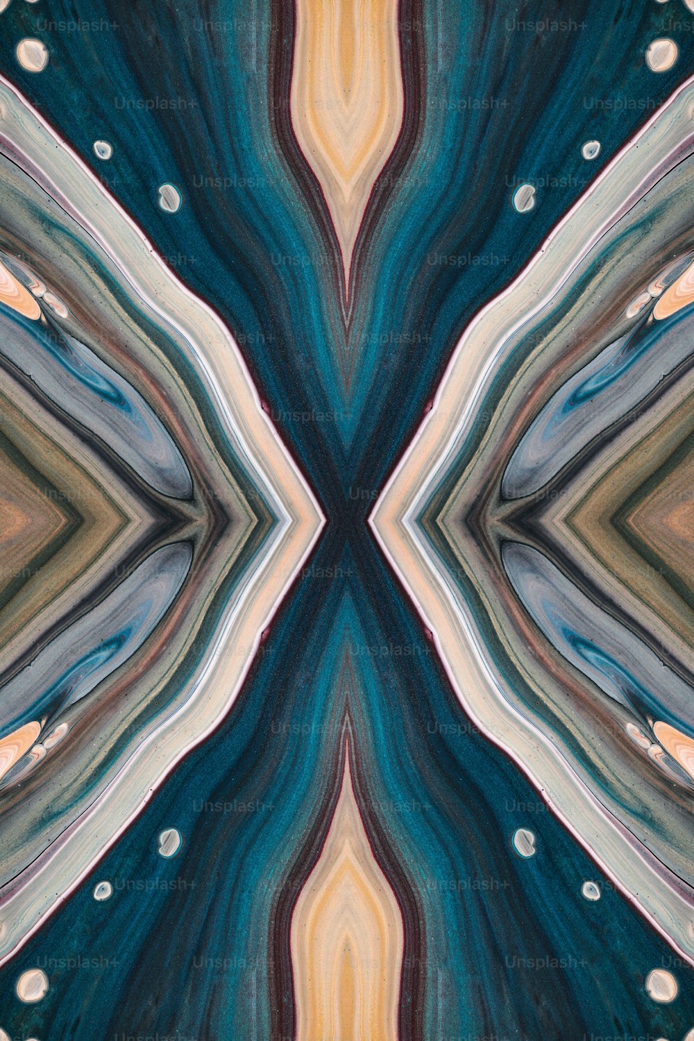 an abstract image of a blue, yellow, and brown pattern