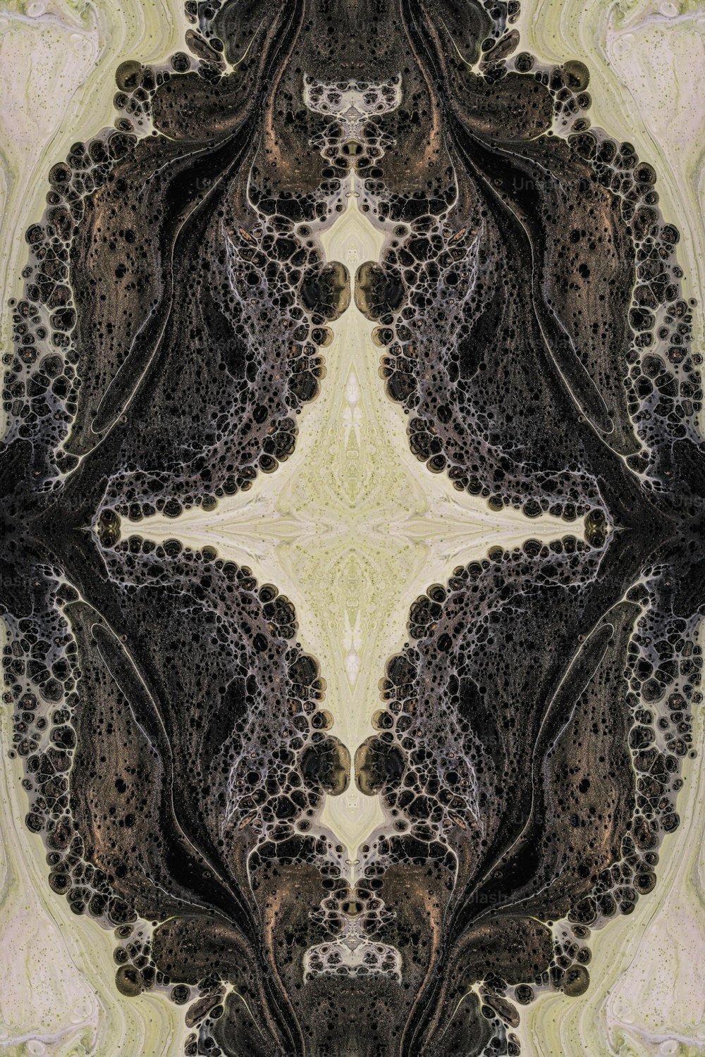 a picture of an abstract design made up of black and beige colors