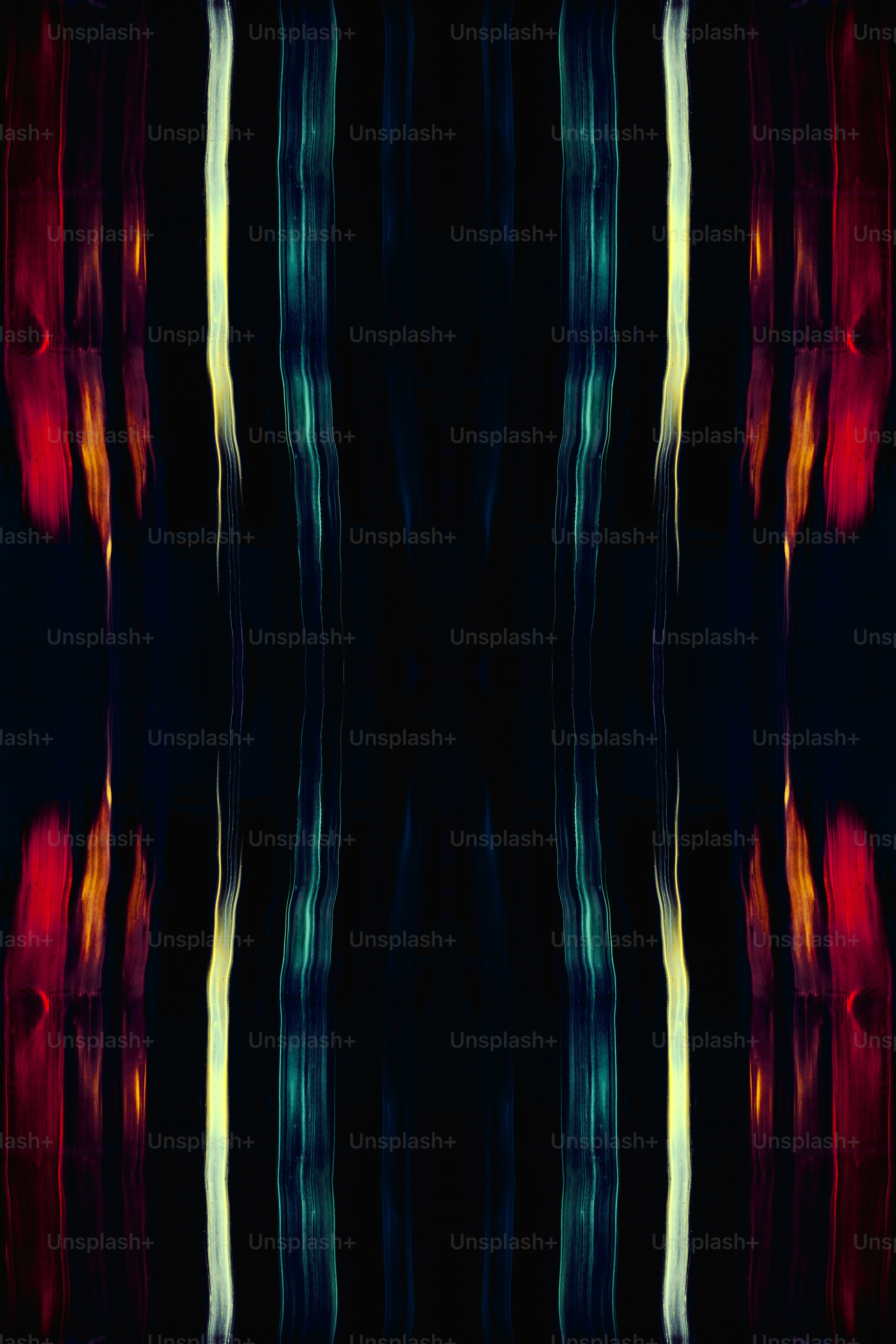 a black background with red, yellow, and blue lines