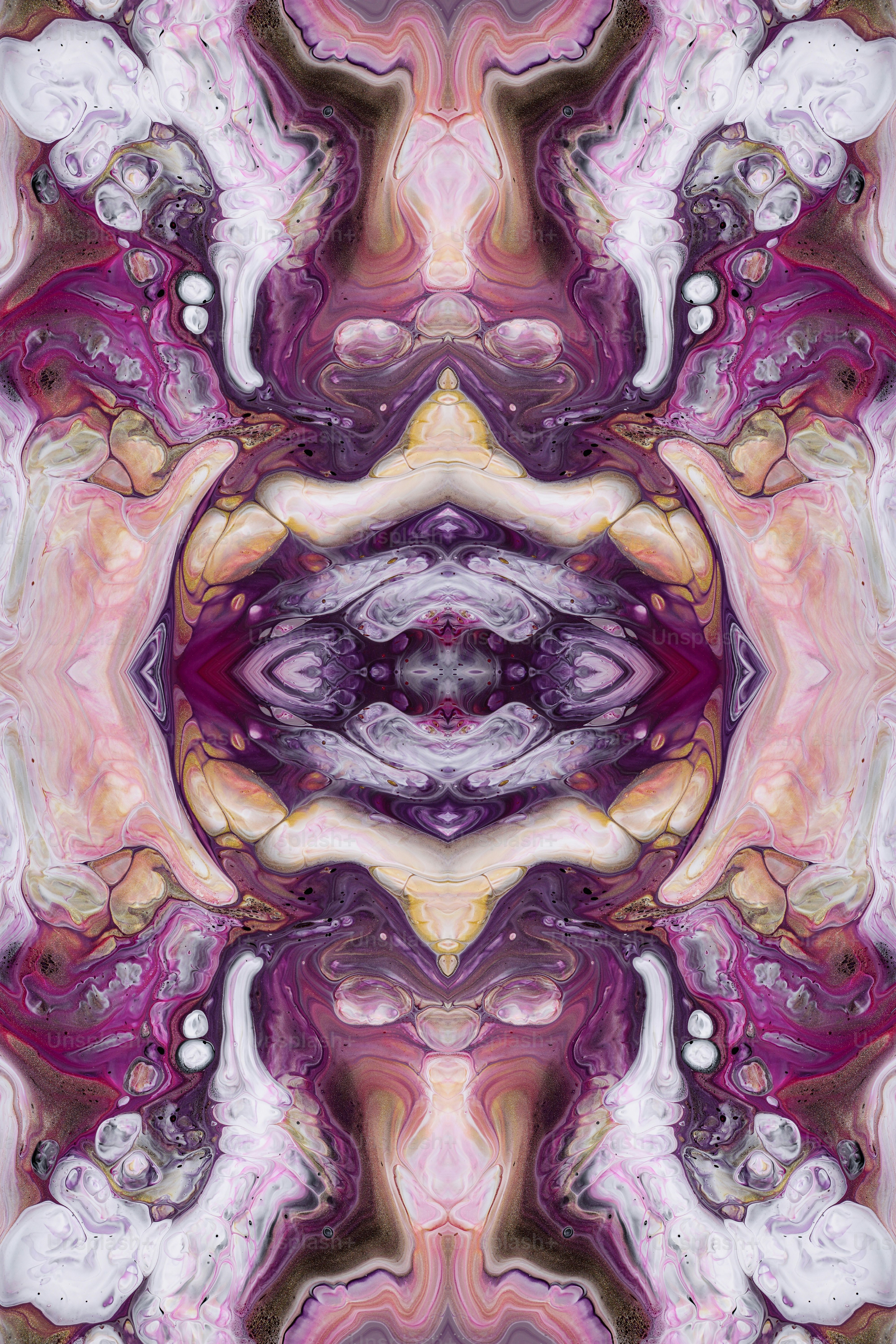 an abstract image of a purple and pink flower