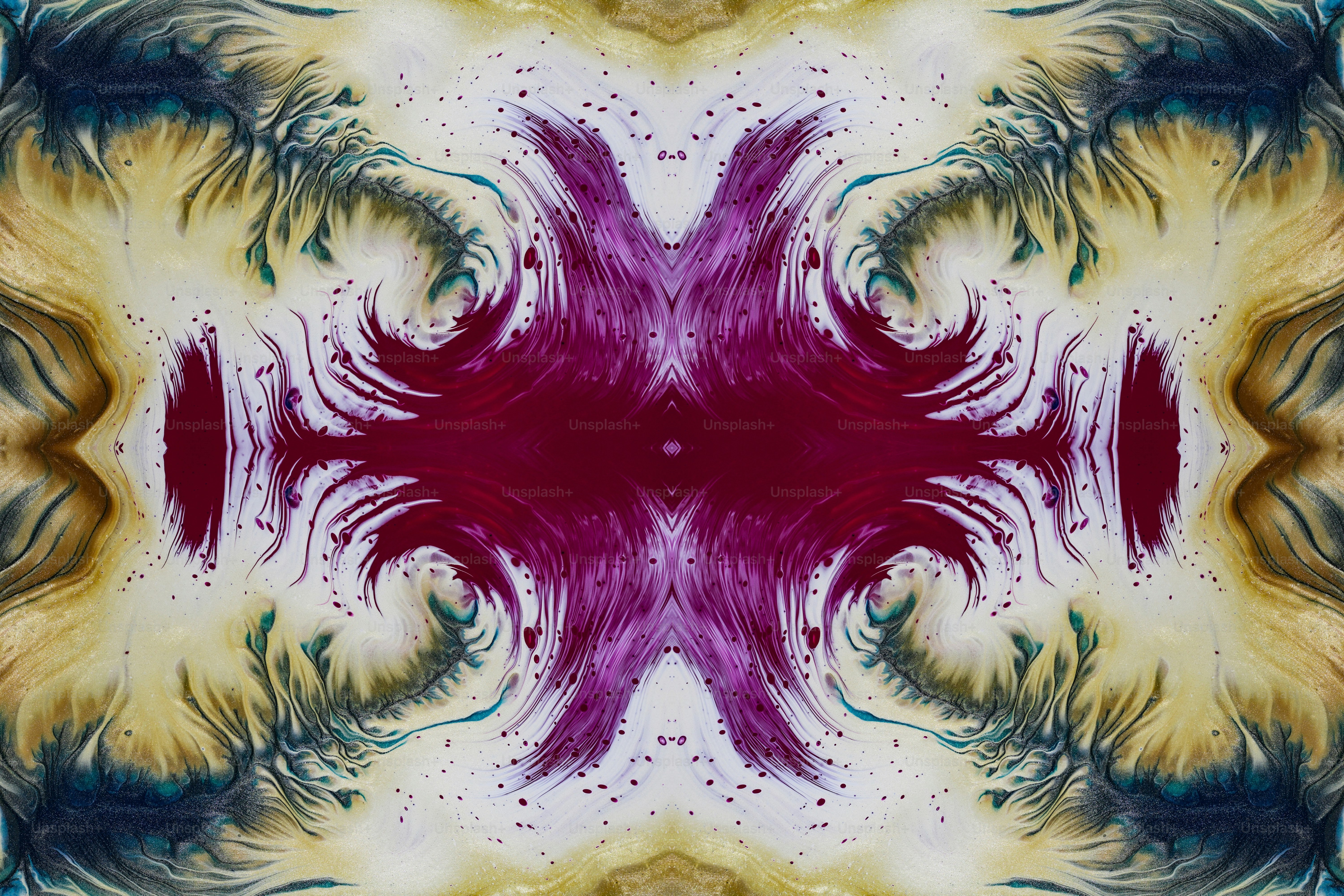 an abstract image of a red and yellow flower