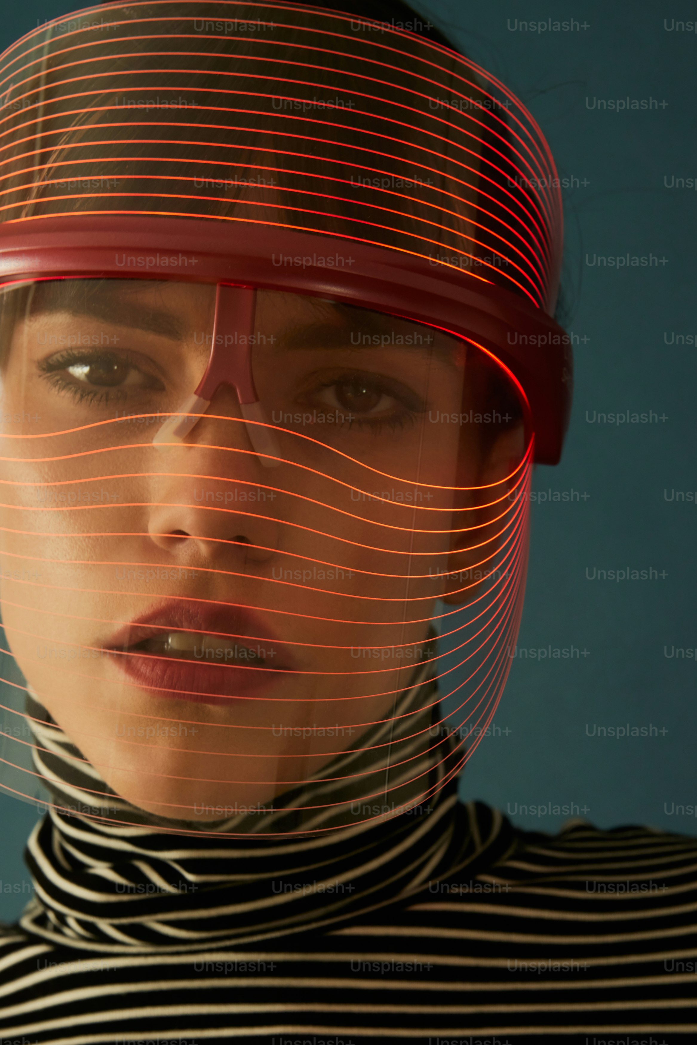 a woman with a hat and glasses on her head