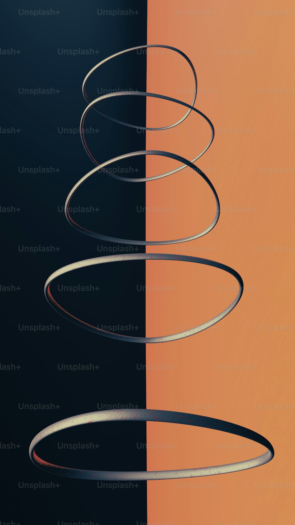 a black and orange background with a spiral design