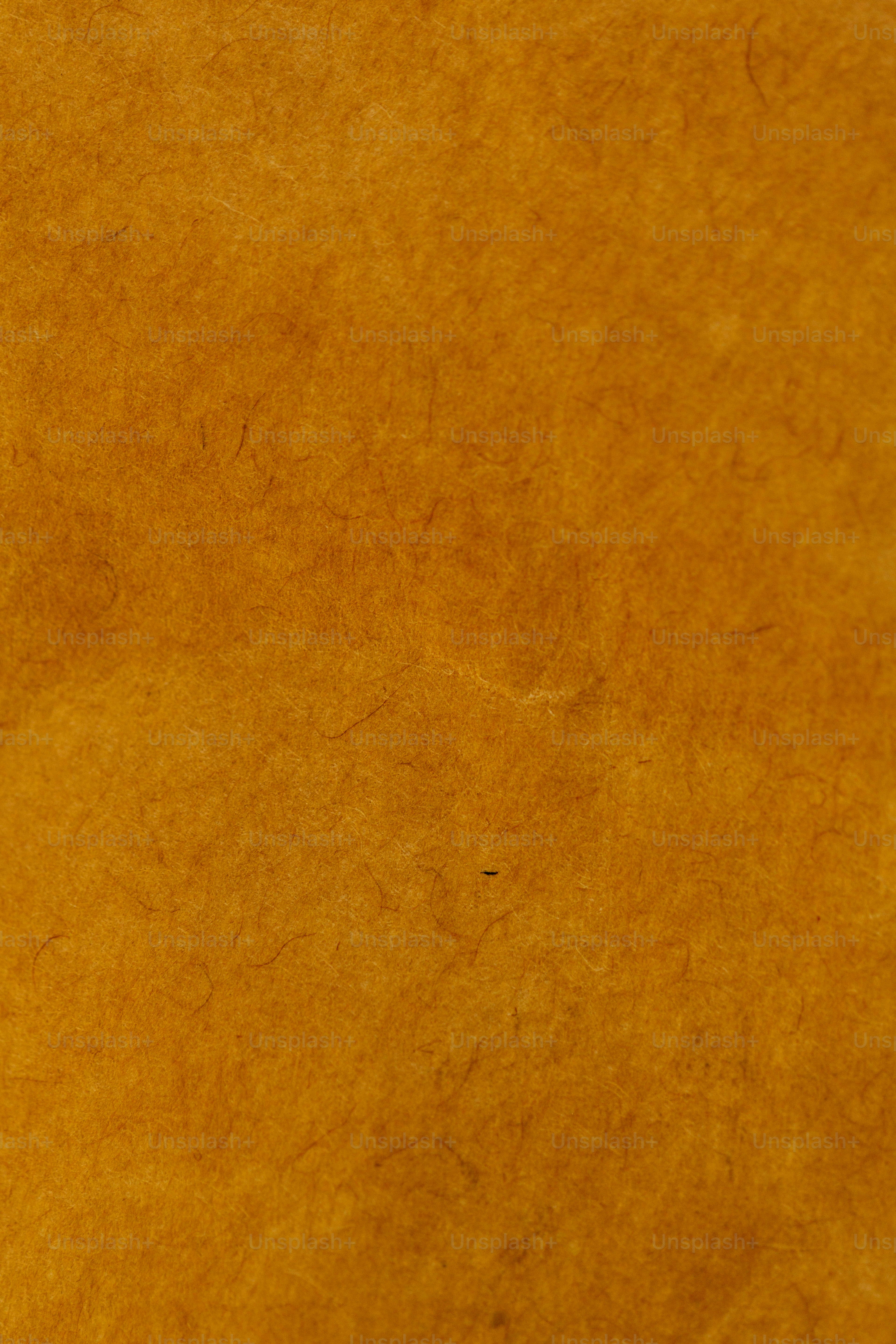 um close up de uma textura de papel marrom