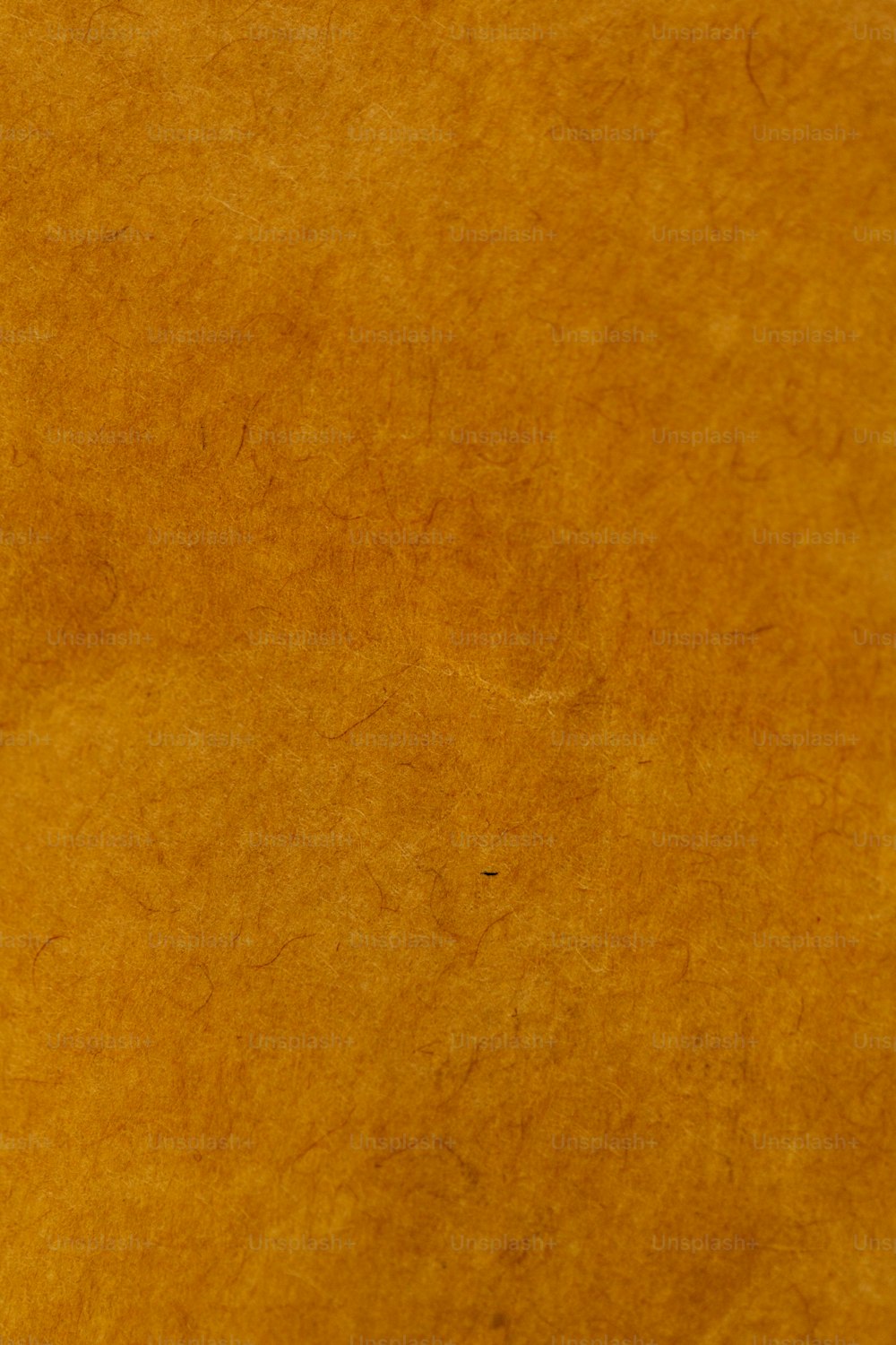 a close up of a brown paper texture
