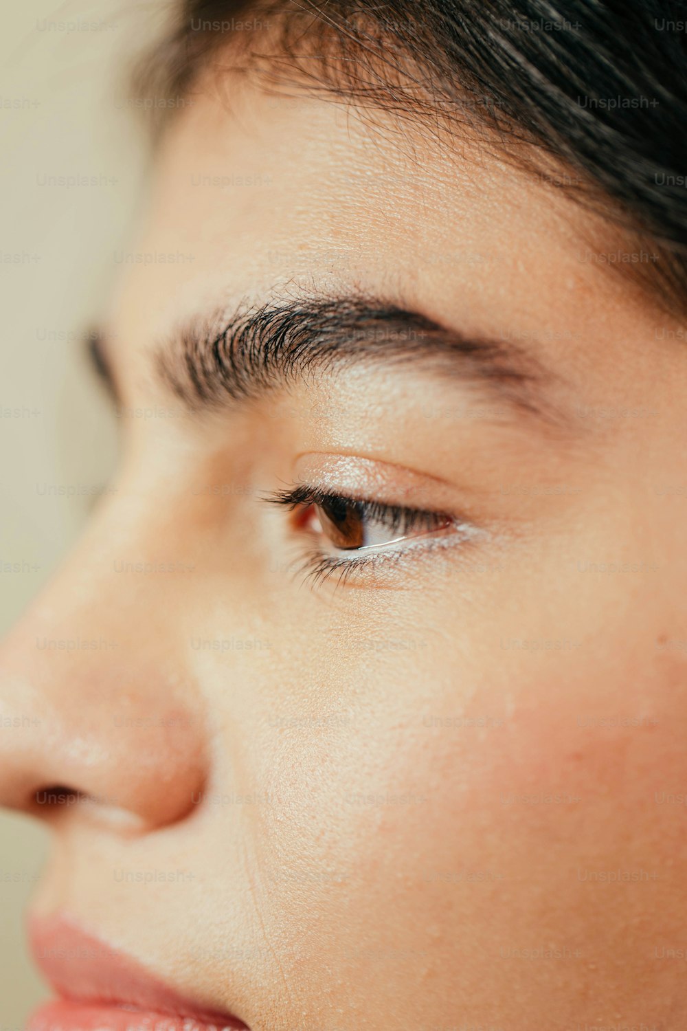 a close up of a person with a nose ring