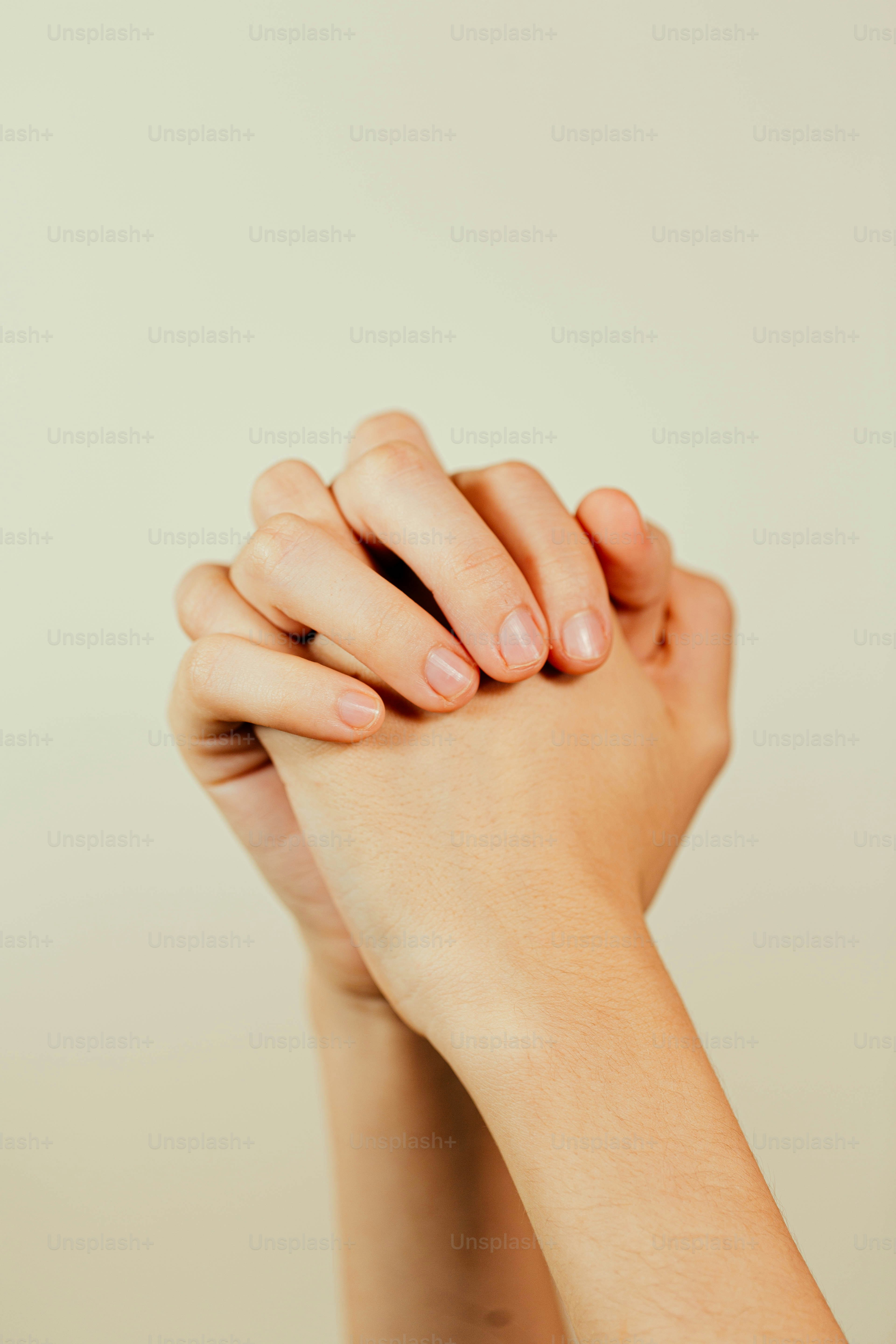 Green double couch with wooden legs