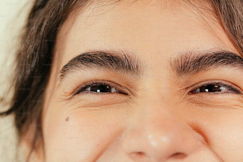 a close up of a person with a toothbrush in their mouth