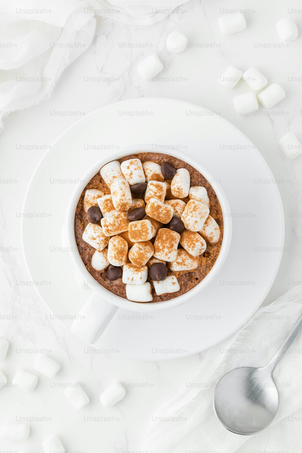 a bowl of hot chocolate with marshmallows in it