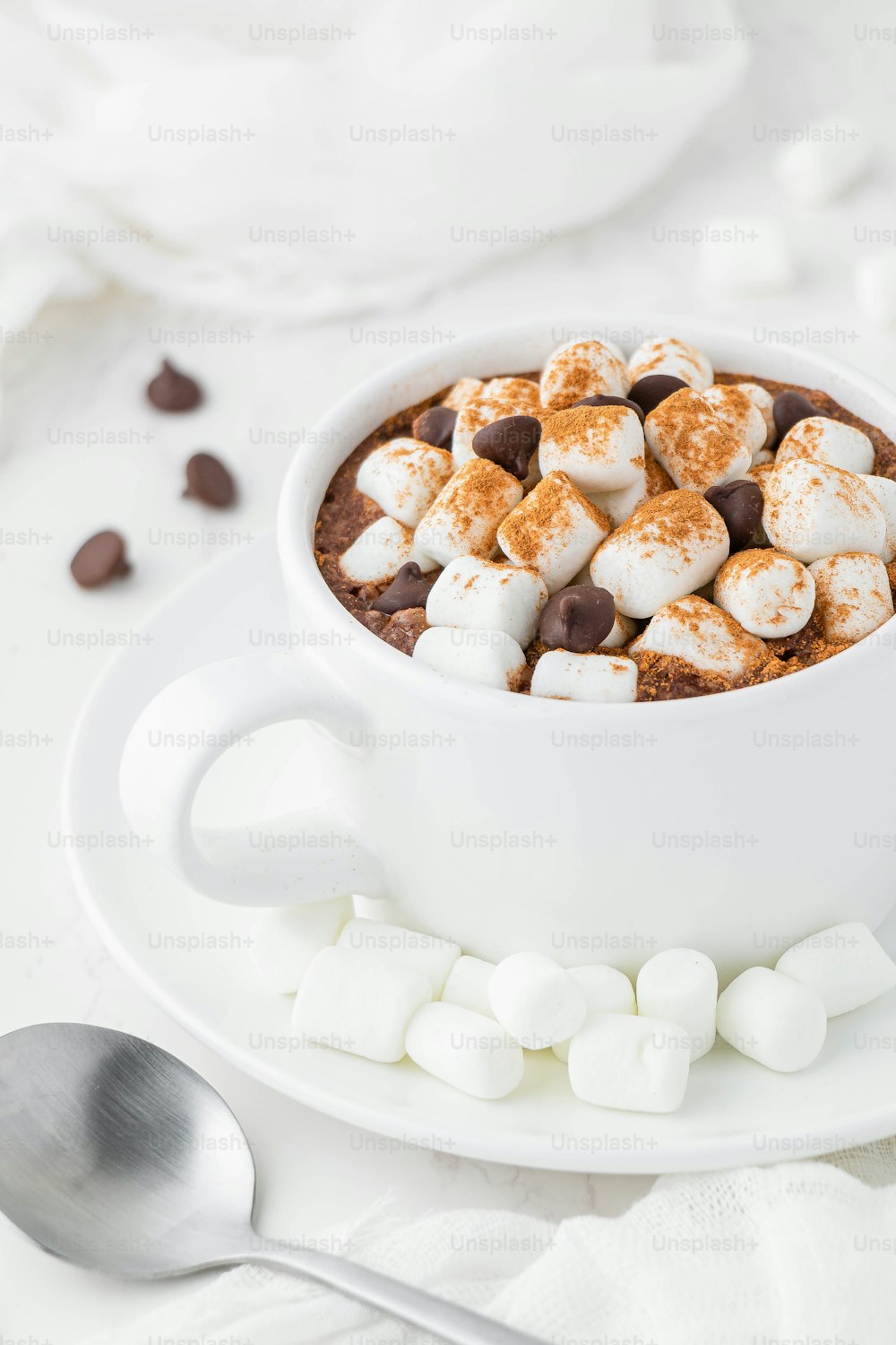 a bowl of hot chocolate with marshmallows in it