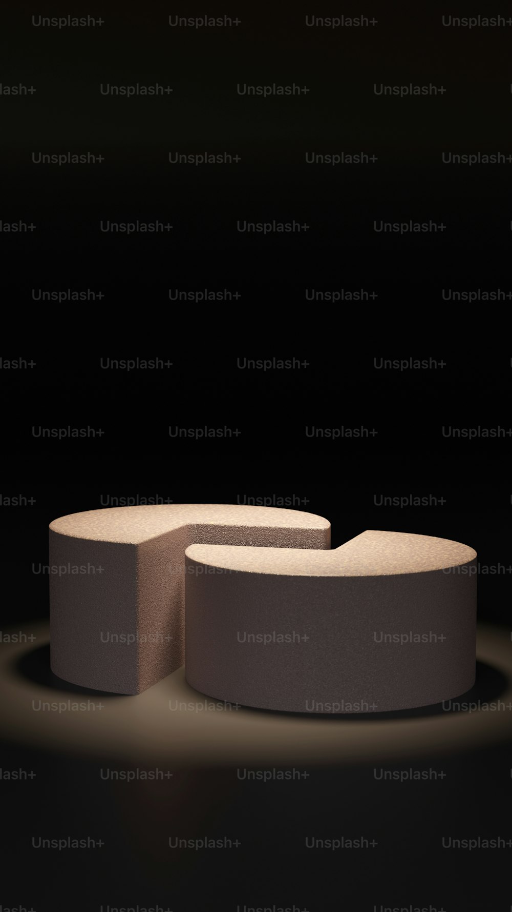 a round table with a circular base on a black background