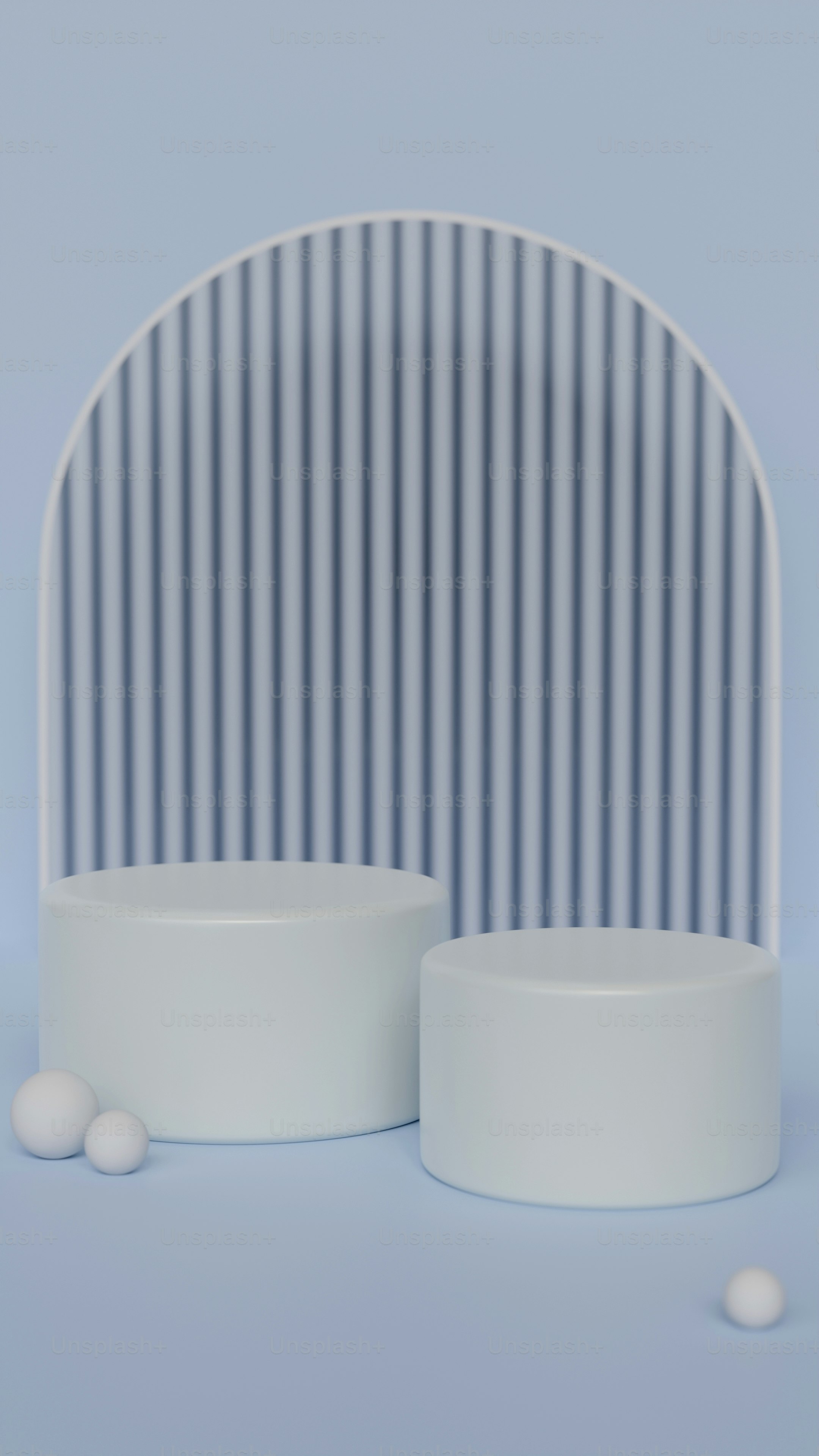 その前に3つの白いボールがある白い物体