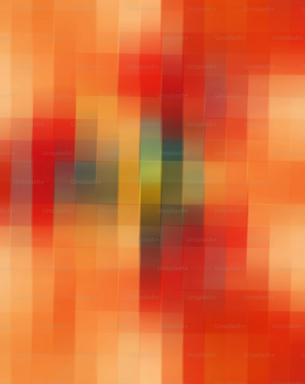une image floue d’un arrière-plan orange et rouge