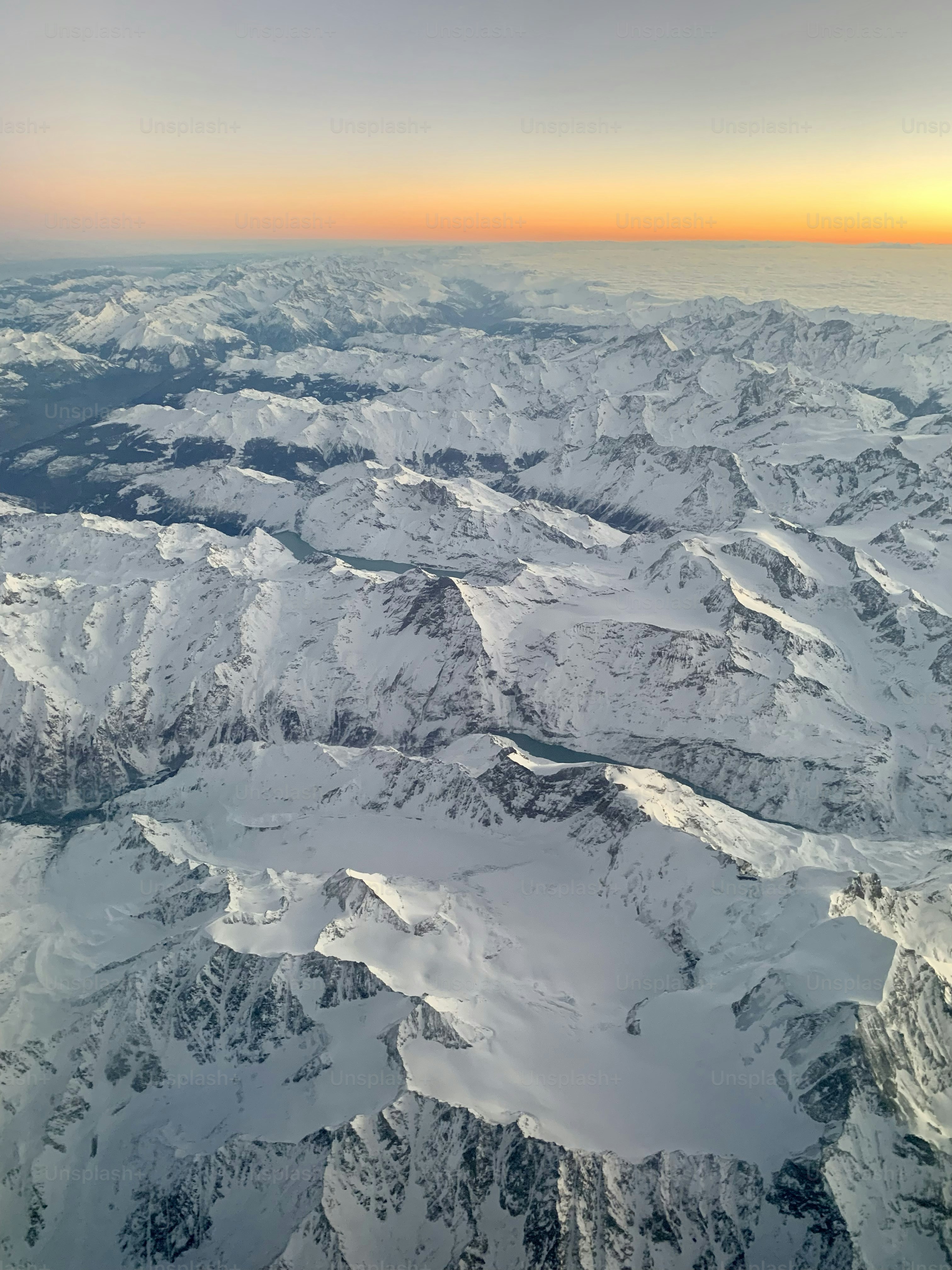 a view of a mountain range from an airplane