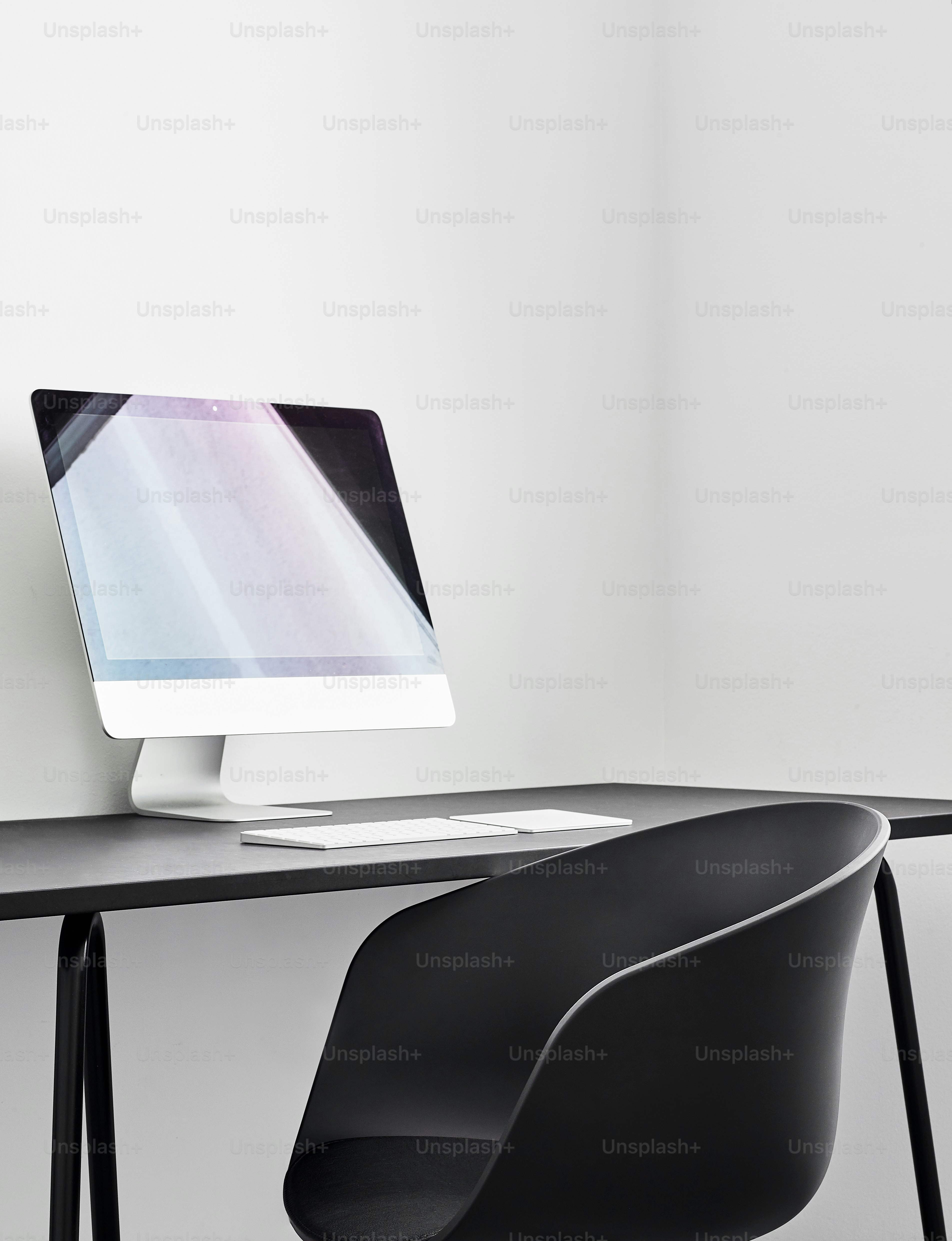 a computer monitor sitting on top of a desk