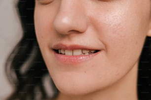 a close up of a person brushing their teeth