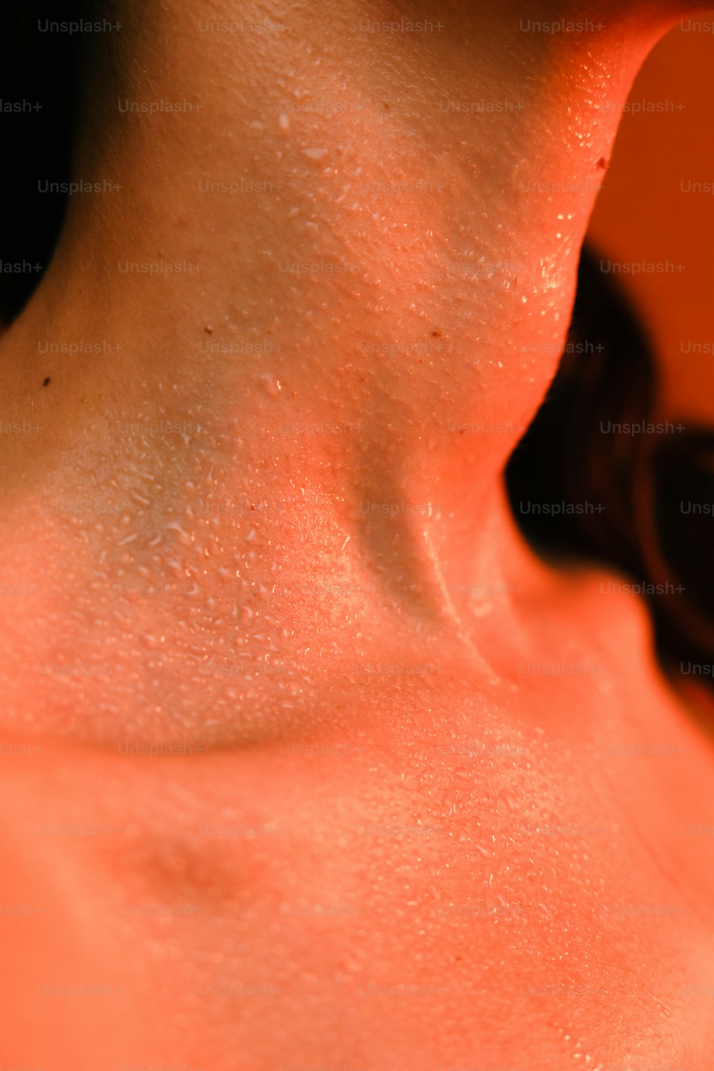 a close up of a woman's neck and neck