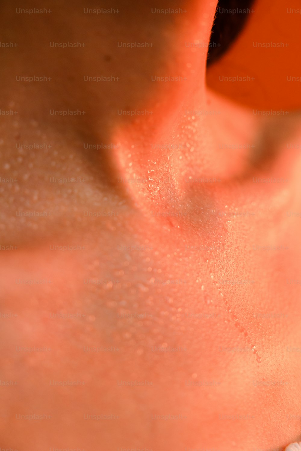 a close up of a person's neck and neck