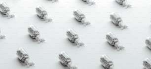 a group of toy cars sitting on top of a white surface