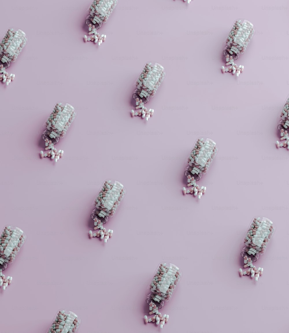 a group of candies on a pink background