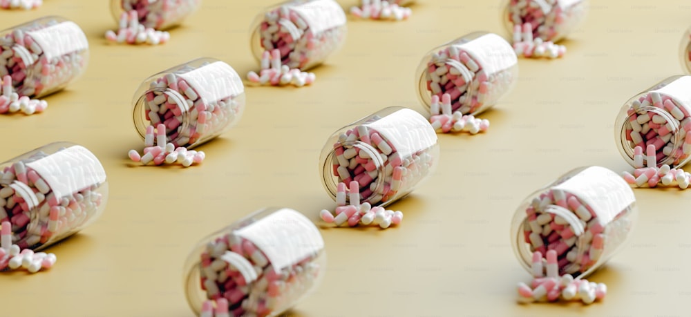 a bunch of pink and white candy in a jar