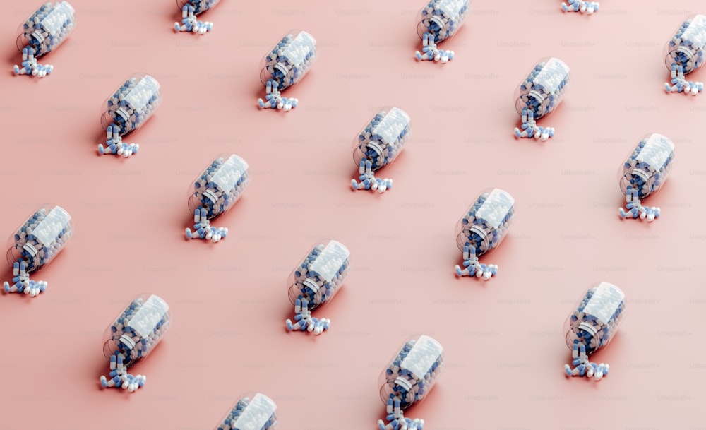 a large group of toy trucks on a pink surface
