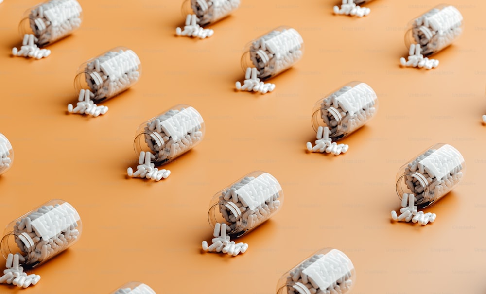 a large group of white objects on a brown surface