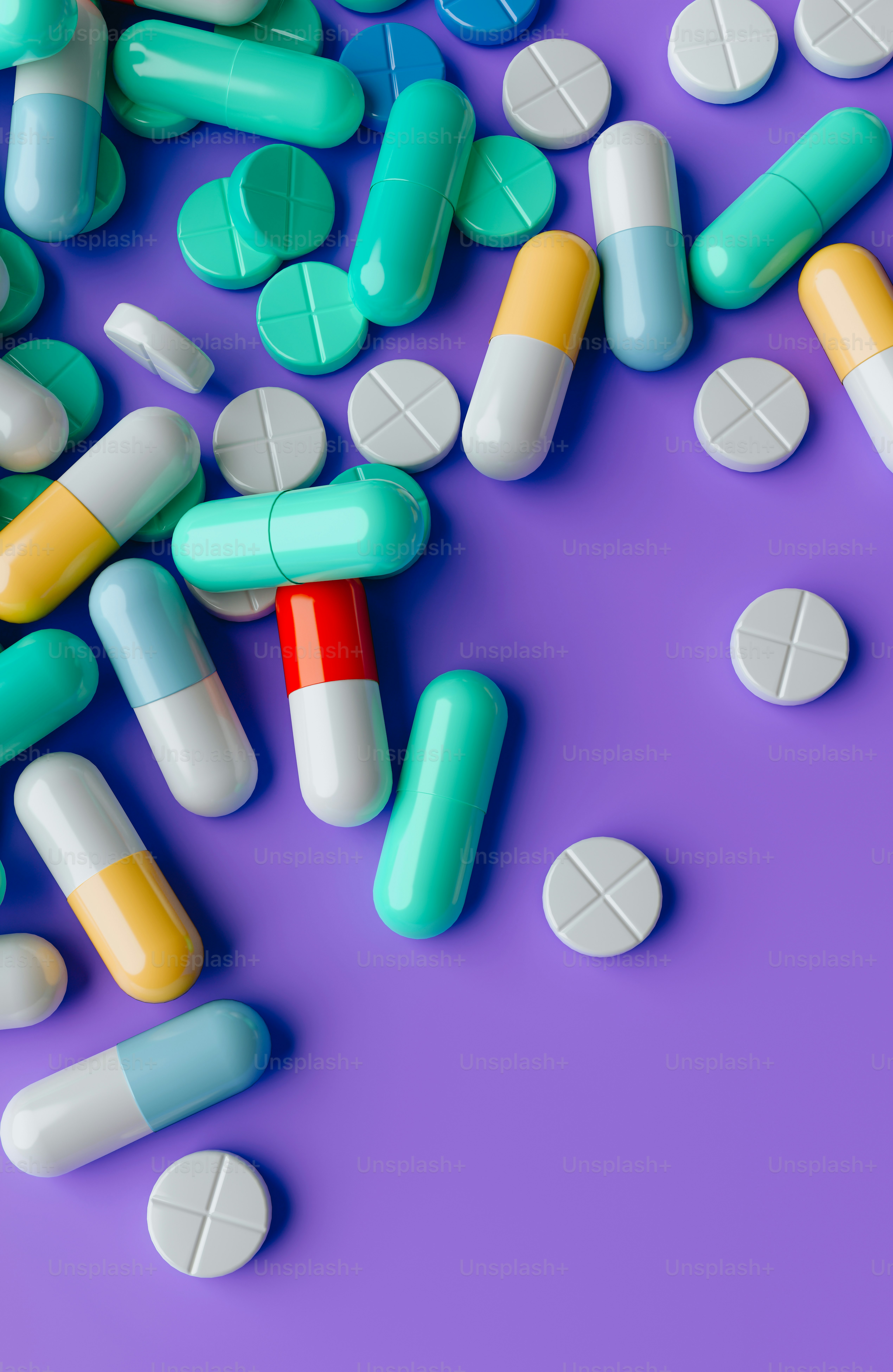 a pile of pills on a purple background