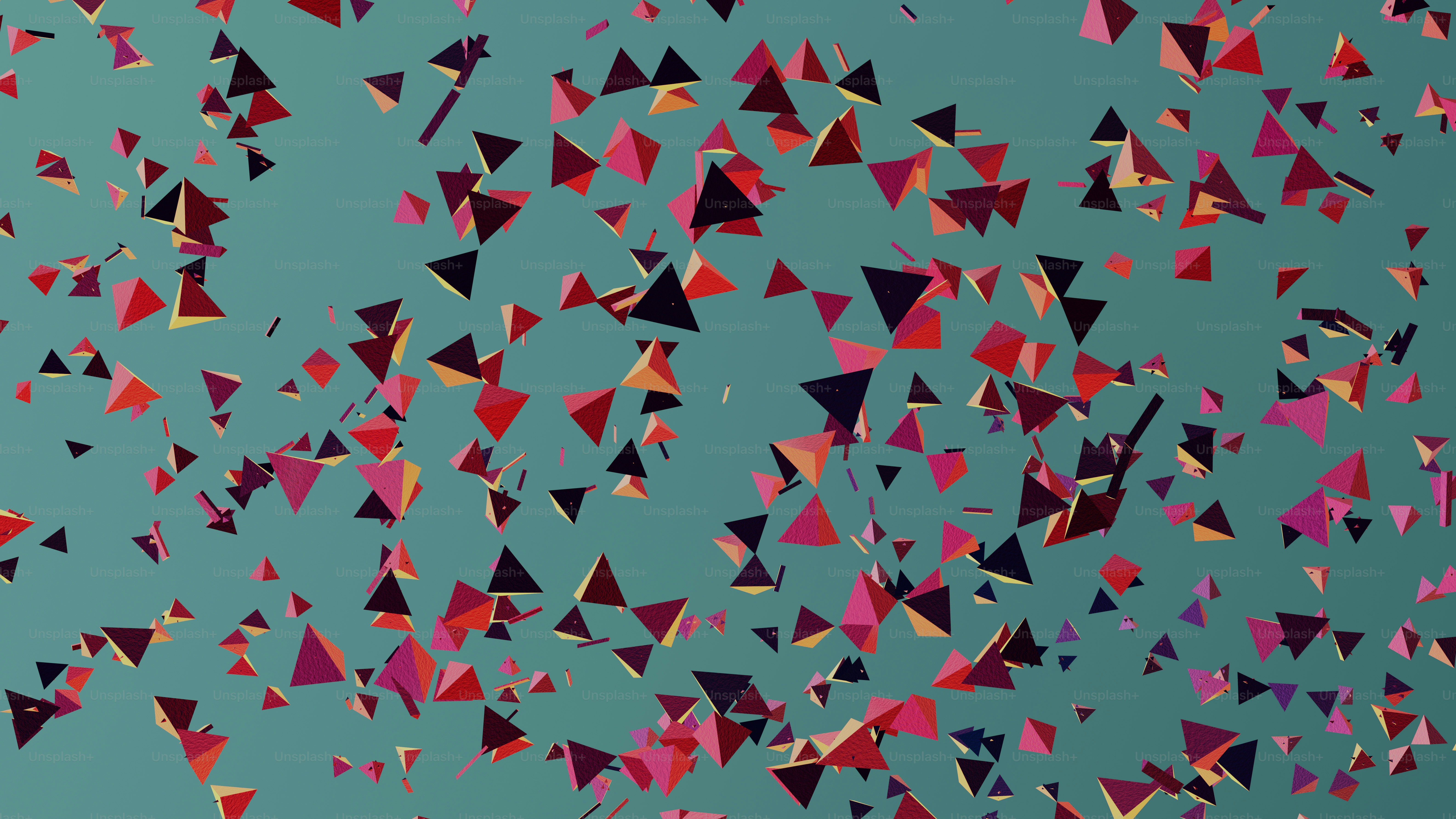 a group of red and black kites flying in the sky