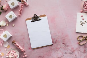 a clipboard with a love note attached to it