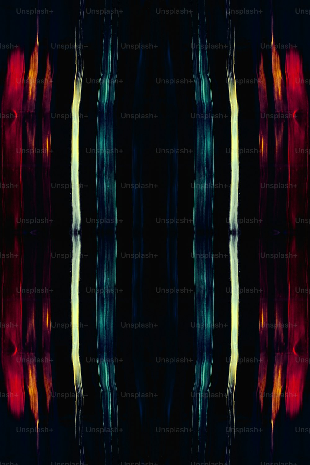 a black background with red, yellow, and green lines