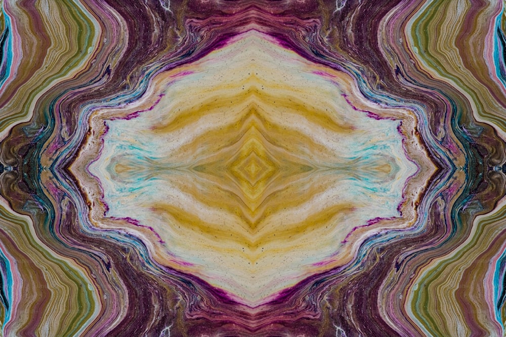 an abstract image of a yellow, purple, and green pattern