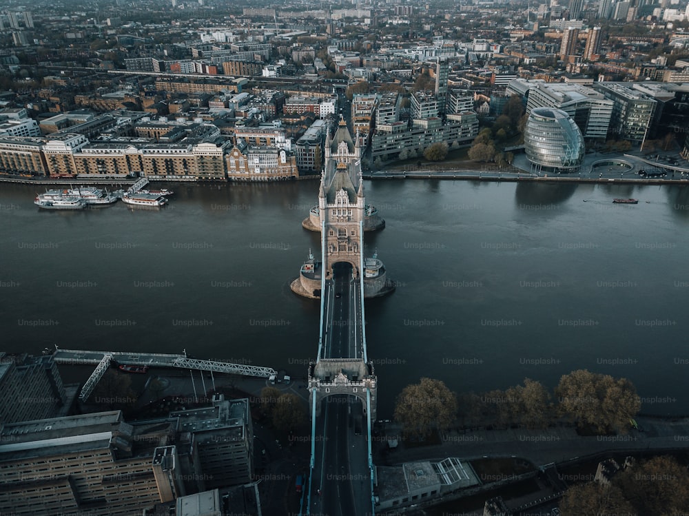 an aerial view of a bridge over a body of water