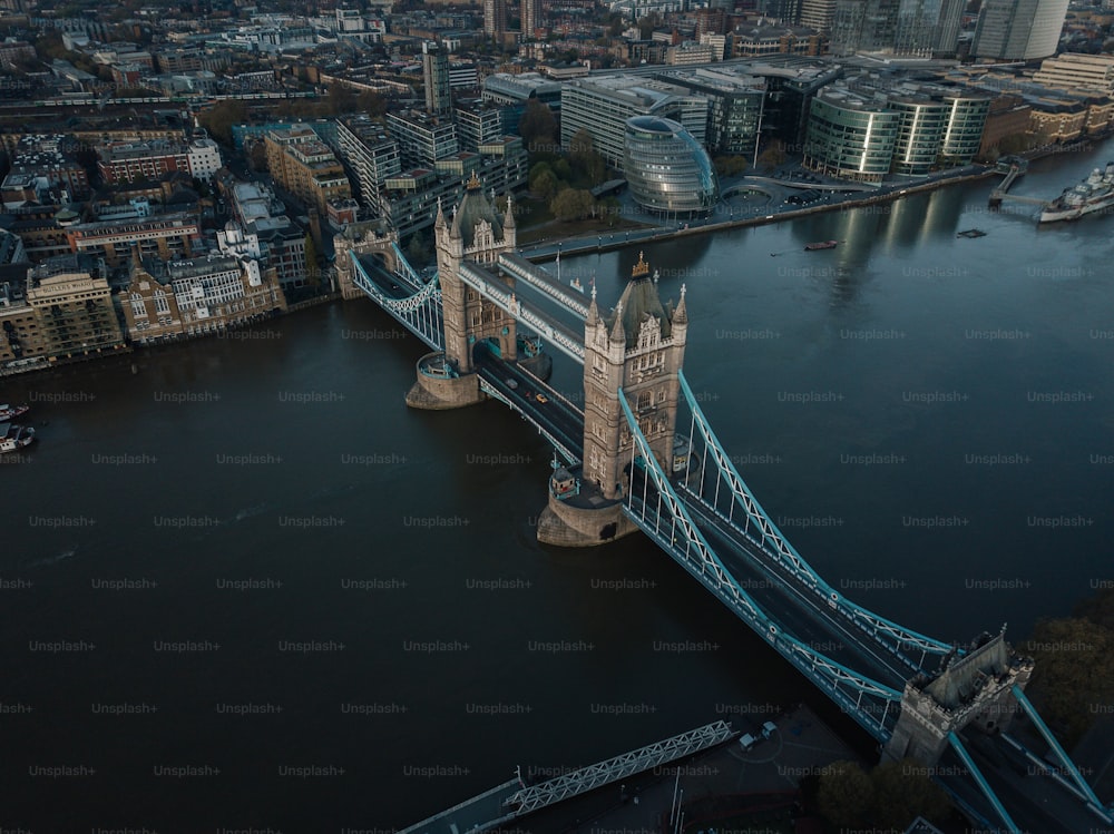 an aerial view of a bridge over a river