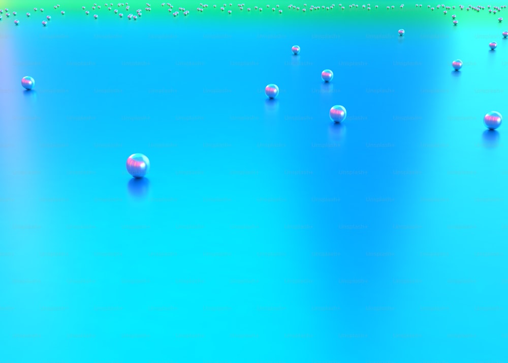 eine Gruppe von Bällen, die auf einer blauen Oberfläche sitzen