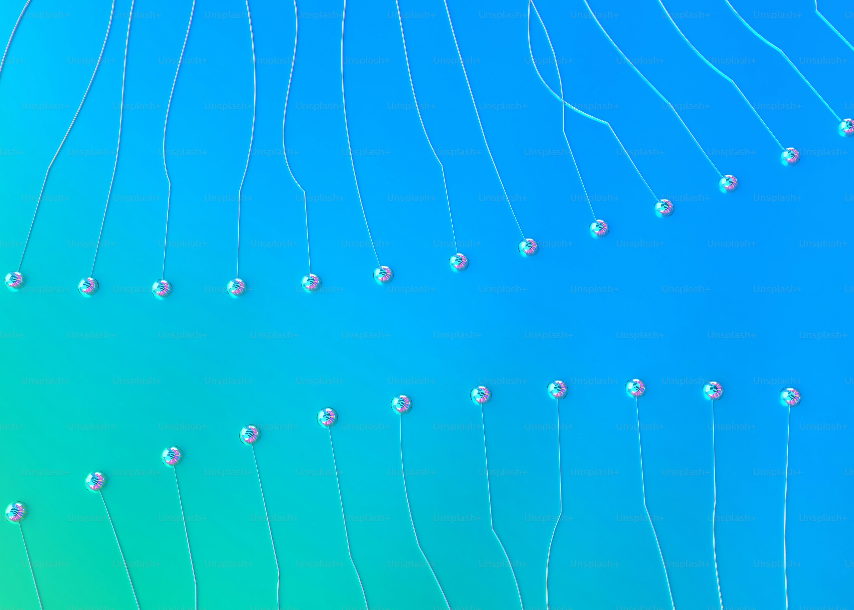 a blue and green background with a bunch of beads