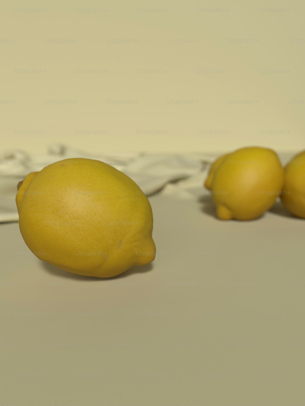 a group of lemons sitting next to each other