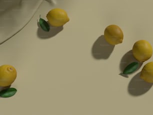 un gruppo di limoni seduti in cima a un tavolo