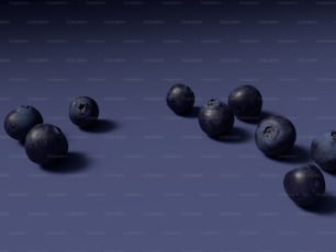 a group of blueberries sitting on top of a table