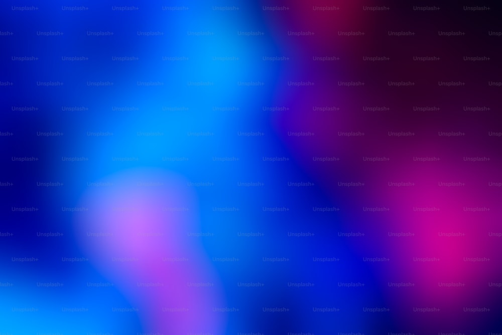 Ein verschwommenes Bild eines blauen und rosa Hintergrunds