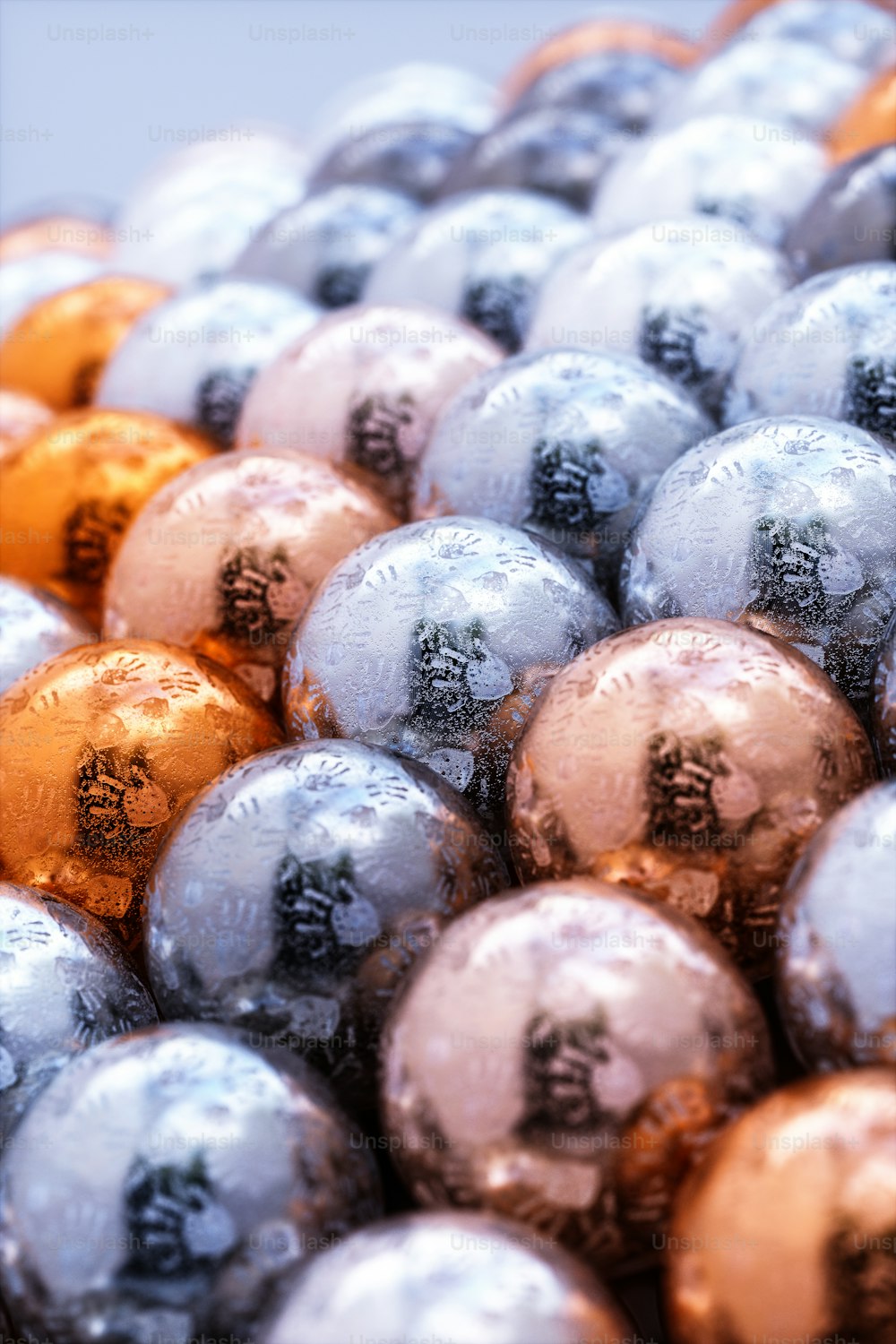 a close up of a bunch of shiny balls