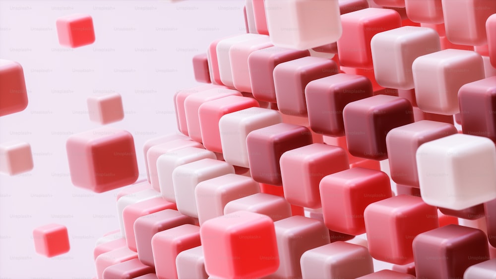 a group of pink and white cubes on a pink background