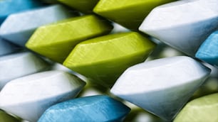 a close up of a group of different colored marshmallows