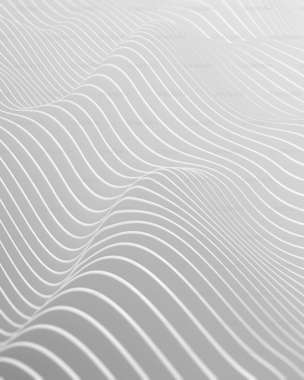 ein abstrakter weißer Hintergrund mit Wellenlinien