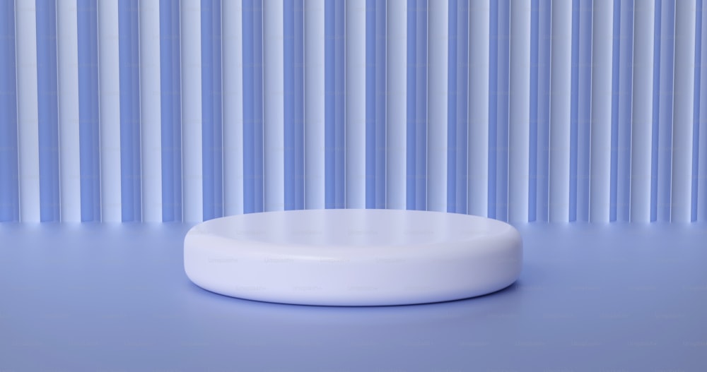 a white object sitting on top of a blue surface