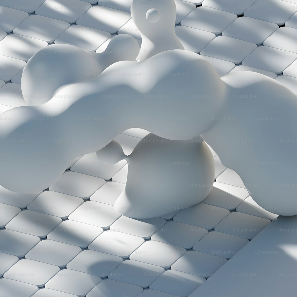a white object is sitting on a tiled surface