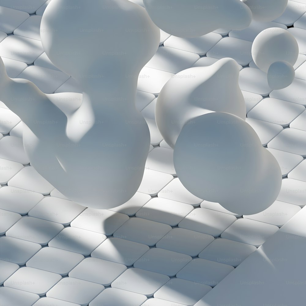 a group of white balls floating on top of a tiled floor