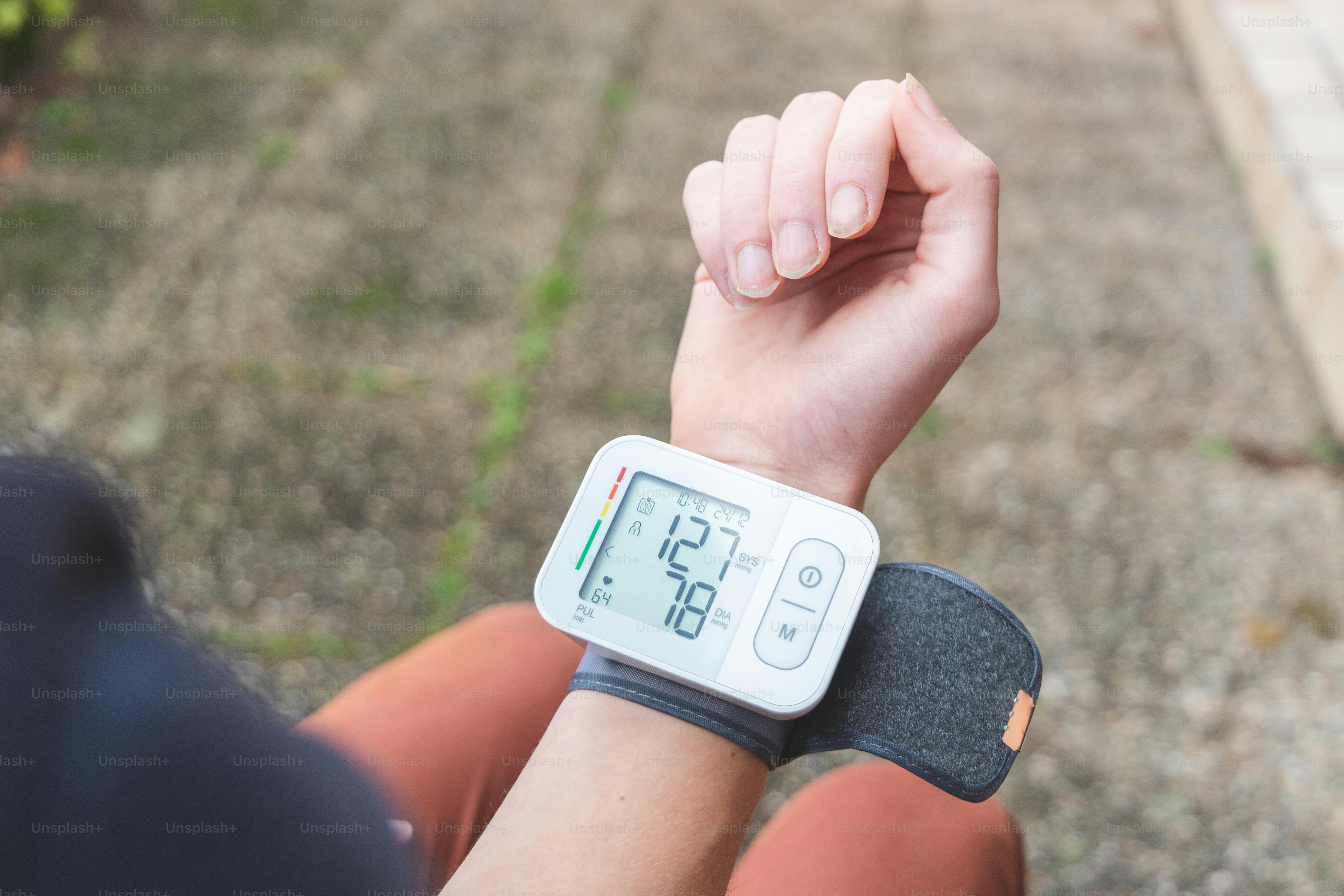 a person with a wrist watch on their arm