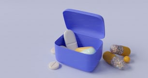 a blue container filled with pills and pills