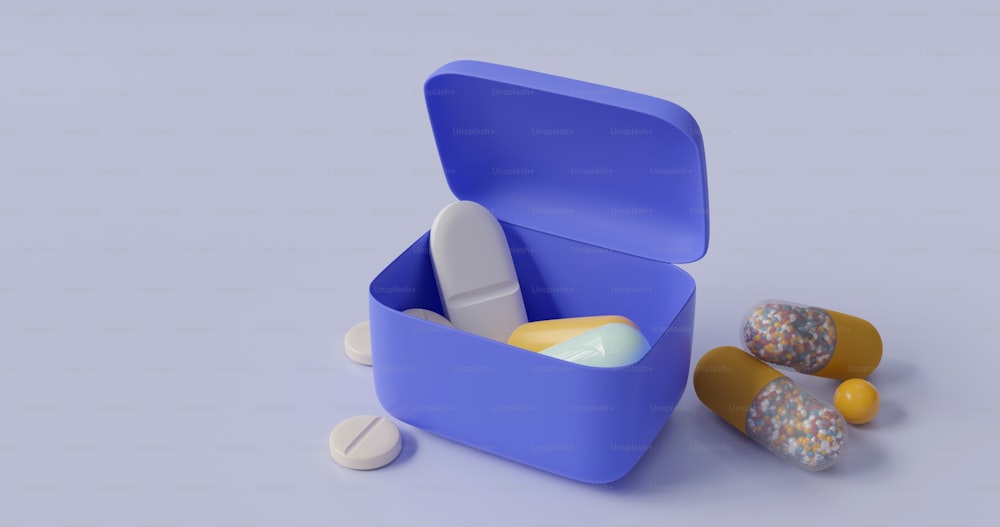a blue container filled with pills and pills